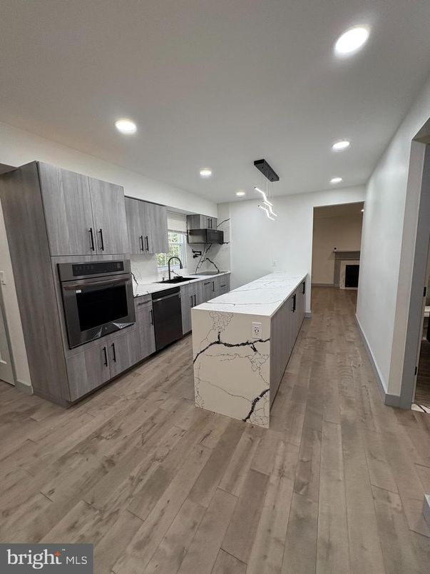 Interior, Kitchen, Pendant Lights, Recessed Lighting, Stainless Steel Appliances, Wood Texture Flooring