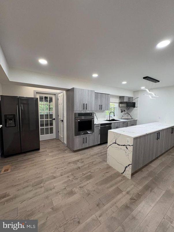 Interior, Kitchen, Pendant Lights, Recessed Lighting, Stainless Steel Appliances, Wood Texture Flooring