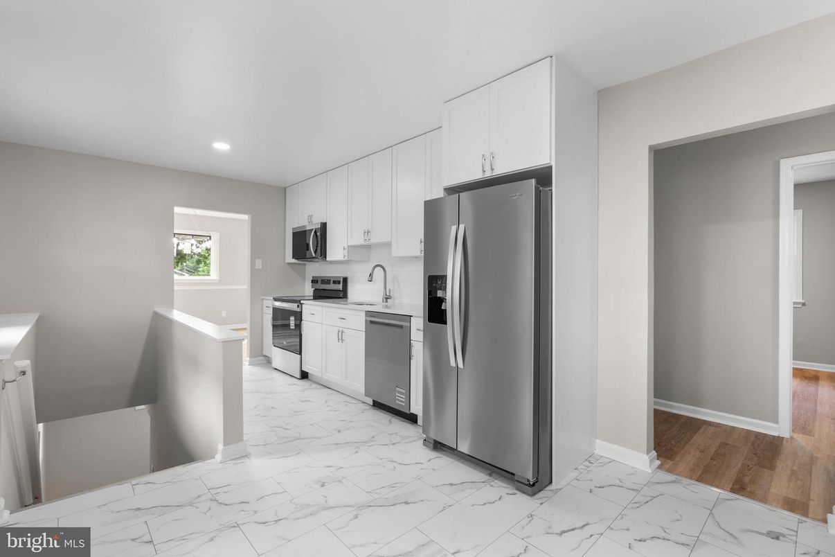 Interior, Kitchen, Marble, Recessed Lighting, Stainless Steel Appliances, Wood Texture Flooring