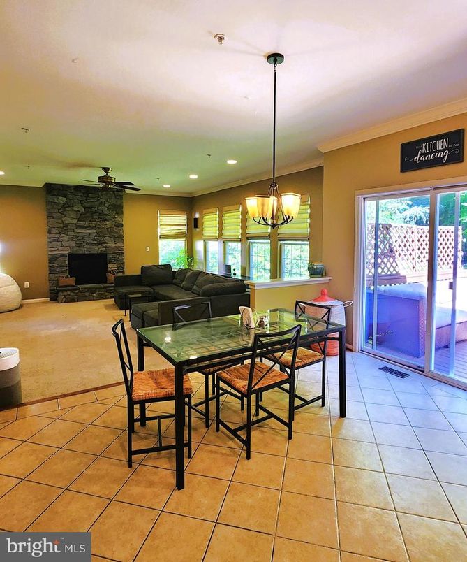 Chandelier, Dining room, Fireplace, Interior, Living room, Recessed Lighting, Stone Walls