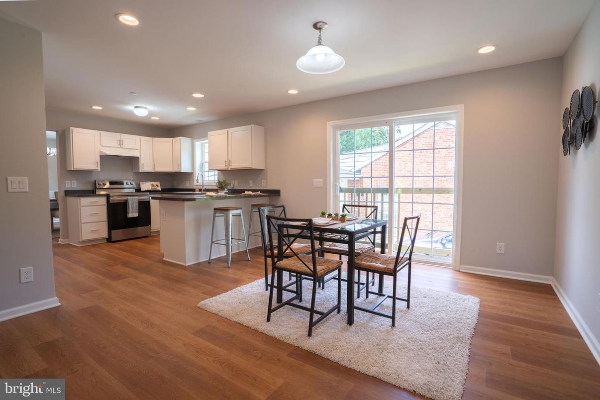 Dining room, Interior, Kitchen, Recessed Lighting, Stainless Steel Appliances, Wood Texture Flooring