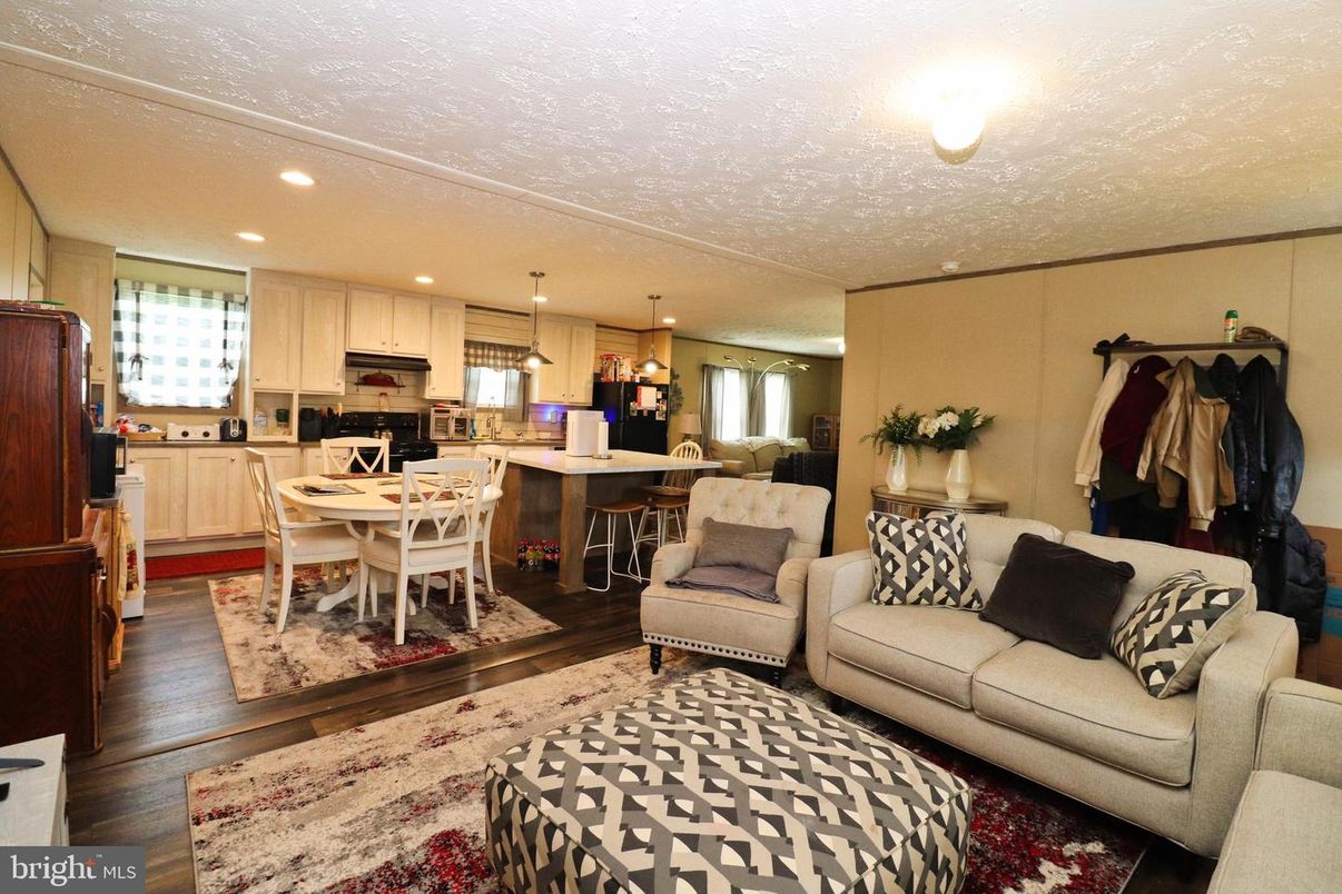 Dining room, Interior, Kitchen, Living room, Pendant Lights, Recessed Lighting, Stainless Steel Appliances, Wood Texture Flooring