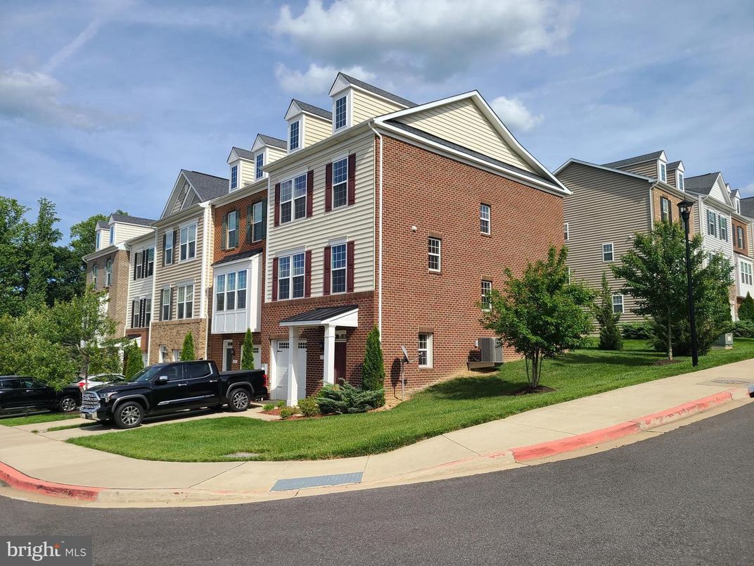 Attached, Exterior, Facade, Brick Facade, Rowhouse