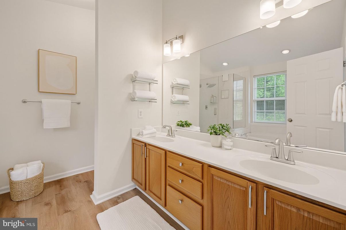 Bathroom, Dual Sink Vanities, Interior, Recessed Lighting, Wood Texture Flooring
