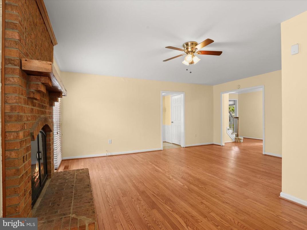 Empty room, Fireplace, Interior, Stone Walls, Wood Texture Flooring