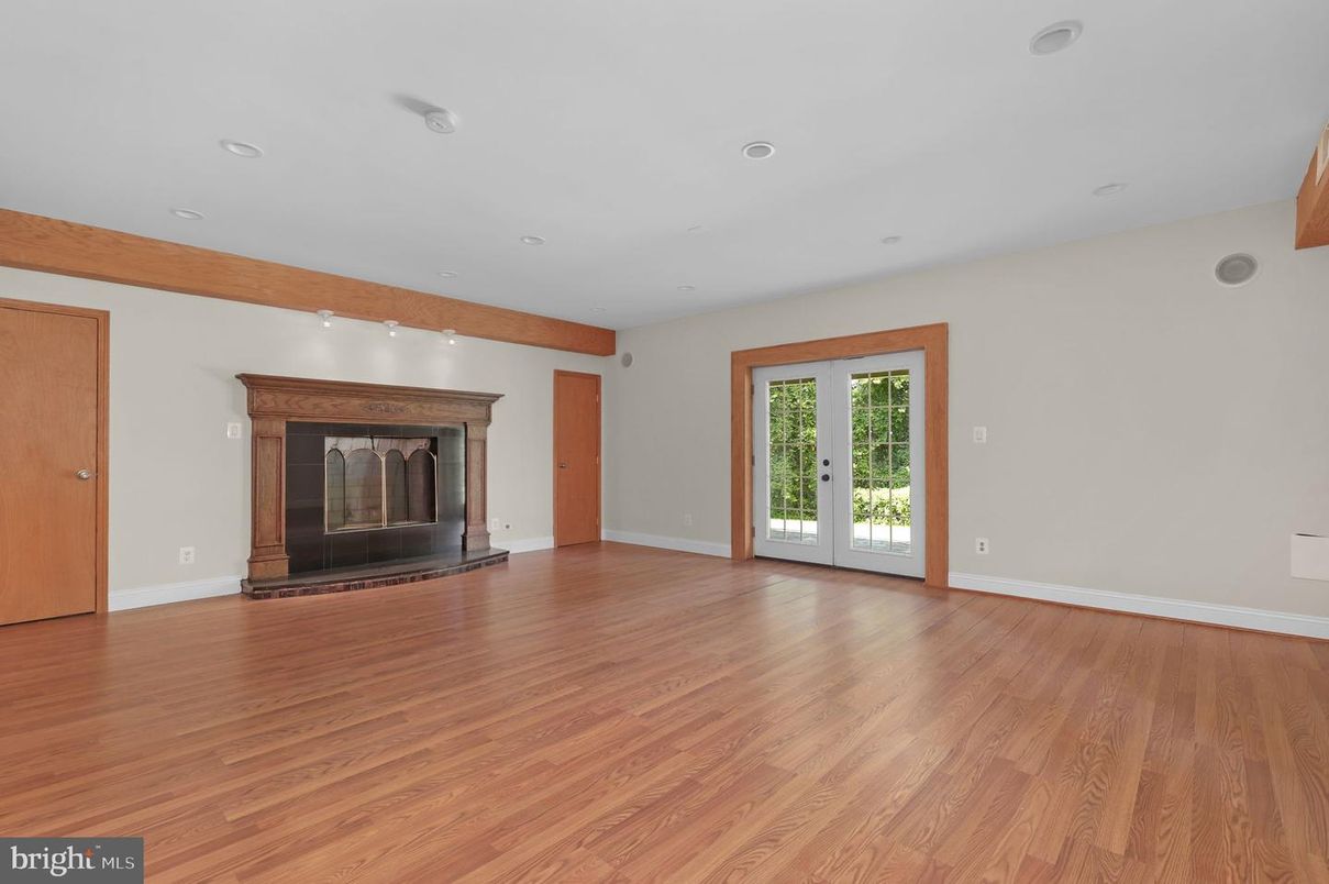 Empty room, Fireplace, Interior, Recessed Lighting, Wooden Beams, Wood Texture Flooring
