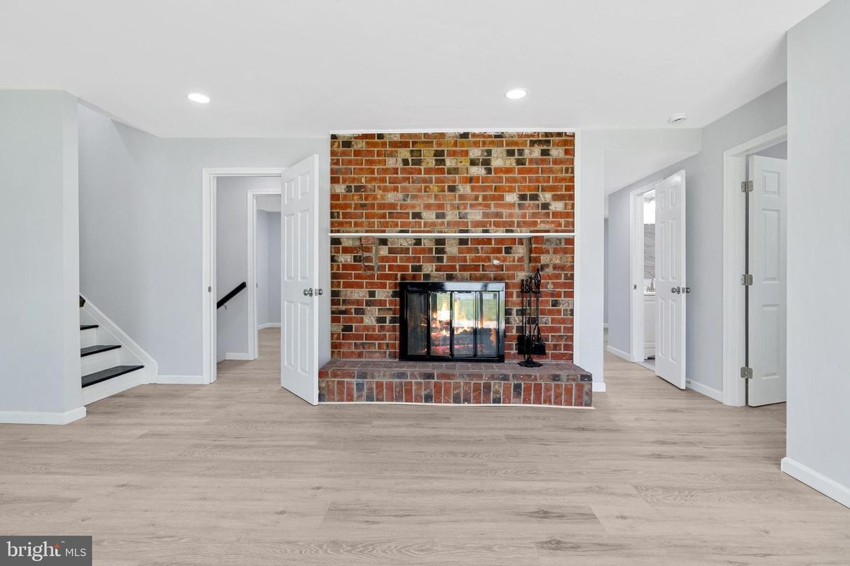 Fireplace, Interior, Recessed Lighting, Stone Walls, Wood Texture Flooring