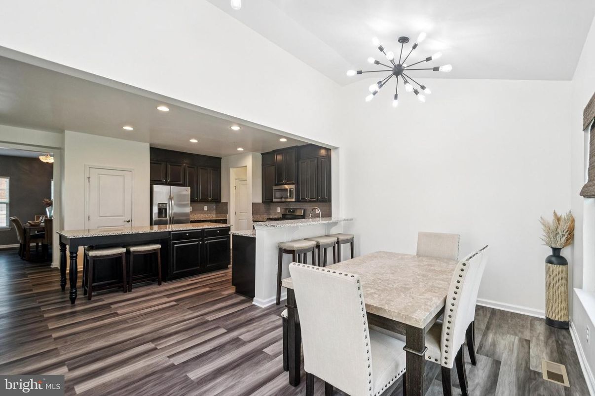 Dining room, Interior, Kitchen, Pendant Lights, Recessed Lighting, Stainless Steel Appliances, Wood Texture Flooring