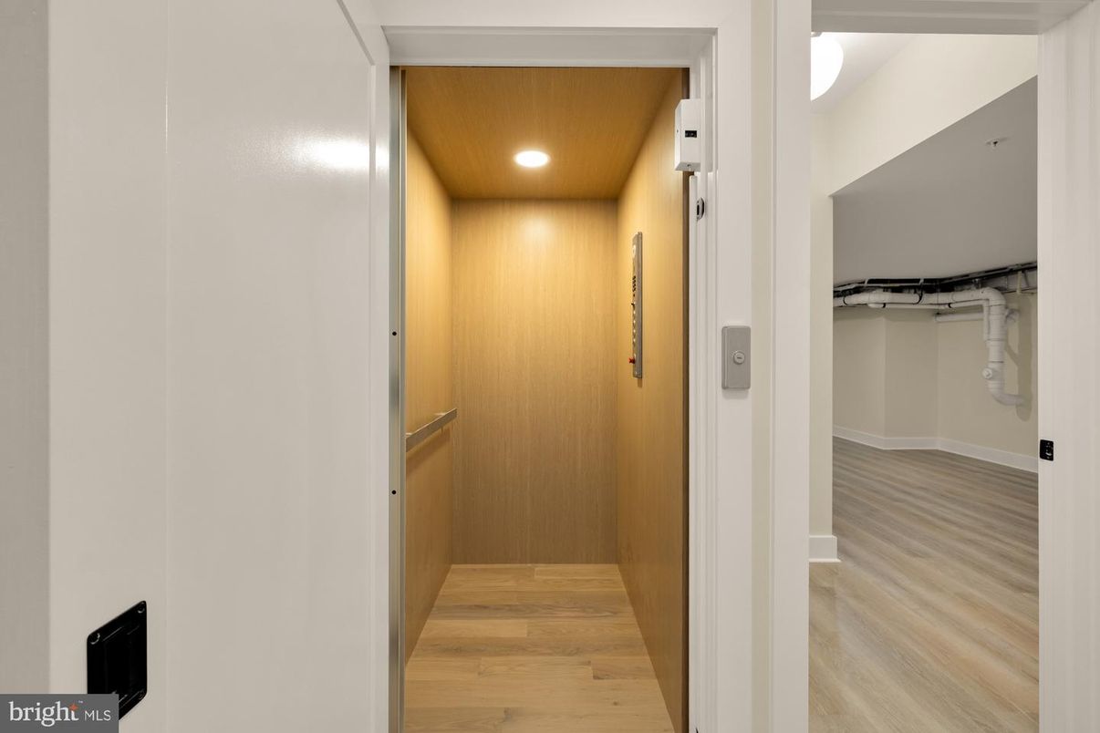 Elevator, Interior, Recessed Lighting, Wooden Ceilings, Wood Texture Flooring, Wooden Walls