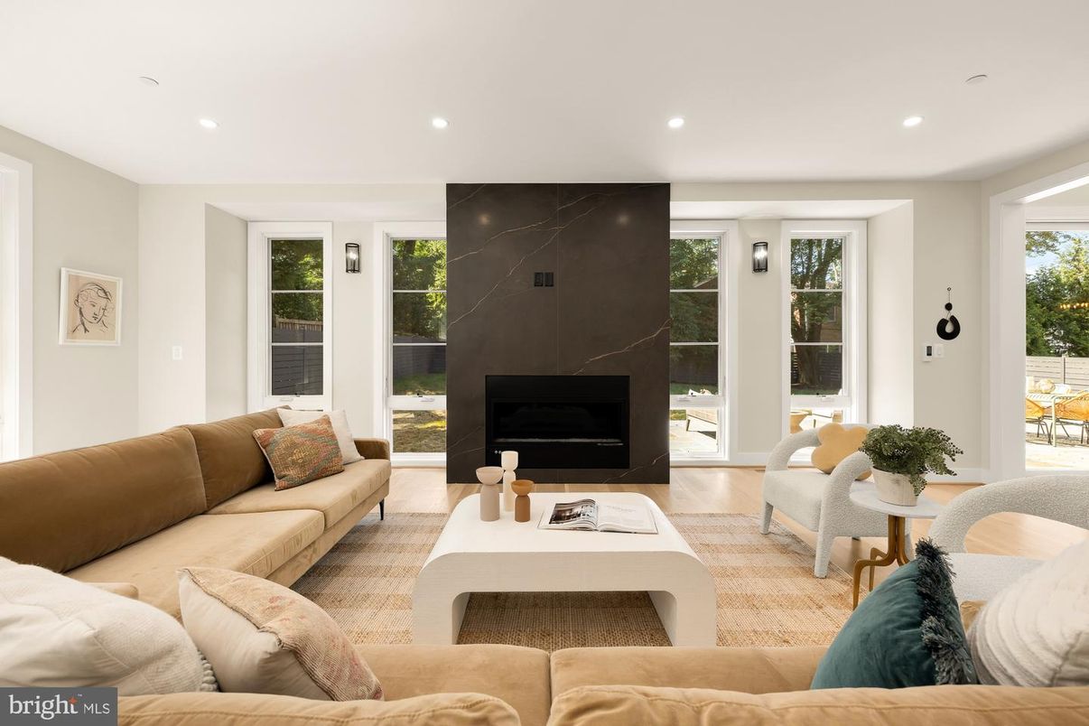 Fireplace, Interior, Living room, Marble Walls, Recessed Lighting, Wood Texture Flooring
