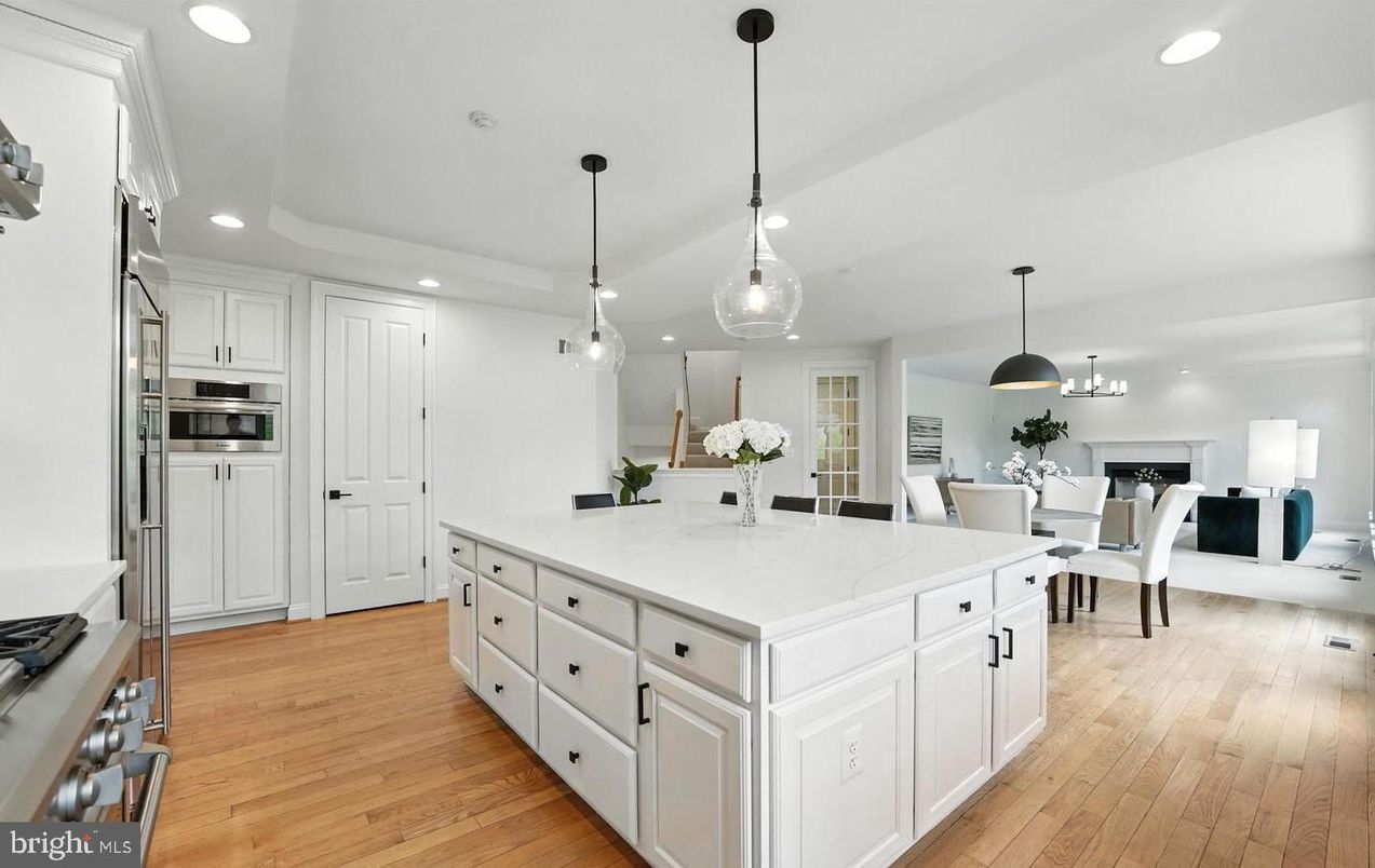 Dining room, Fireplace, Interior, Kitchen, Living room, Pendant Lights, Recessed Lighting, Stainless Steel Appliances, Wood Texture Flooring