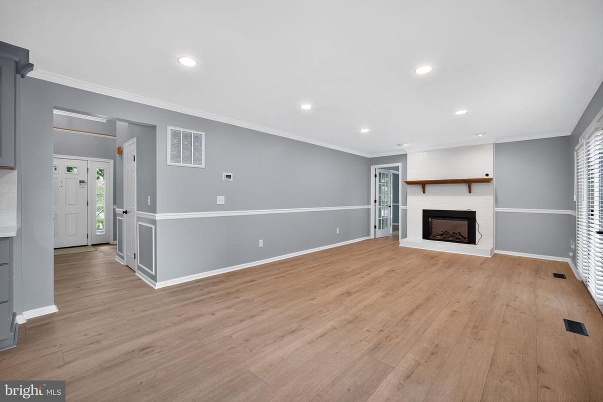 Empty room, Fireplace, Interior, Recessed Lighting, Wood Texture Flooring