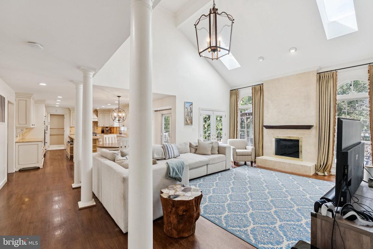 Chandelier, Fireplace, Interior, Kitchen, Living room, Pendant Lights, Recessed Lighting, Wood Texture Flooring