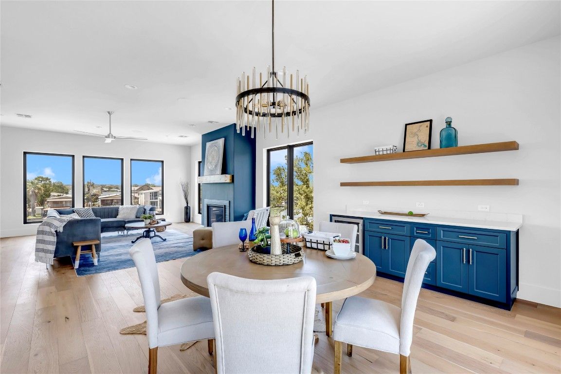 Dining room, Fireplace, Interior, Living room, Pendant Lights, Recessed Lighting, Wood Texture Flooring