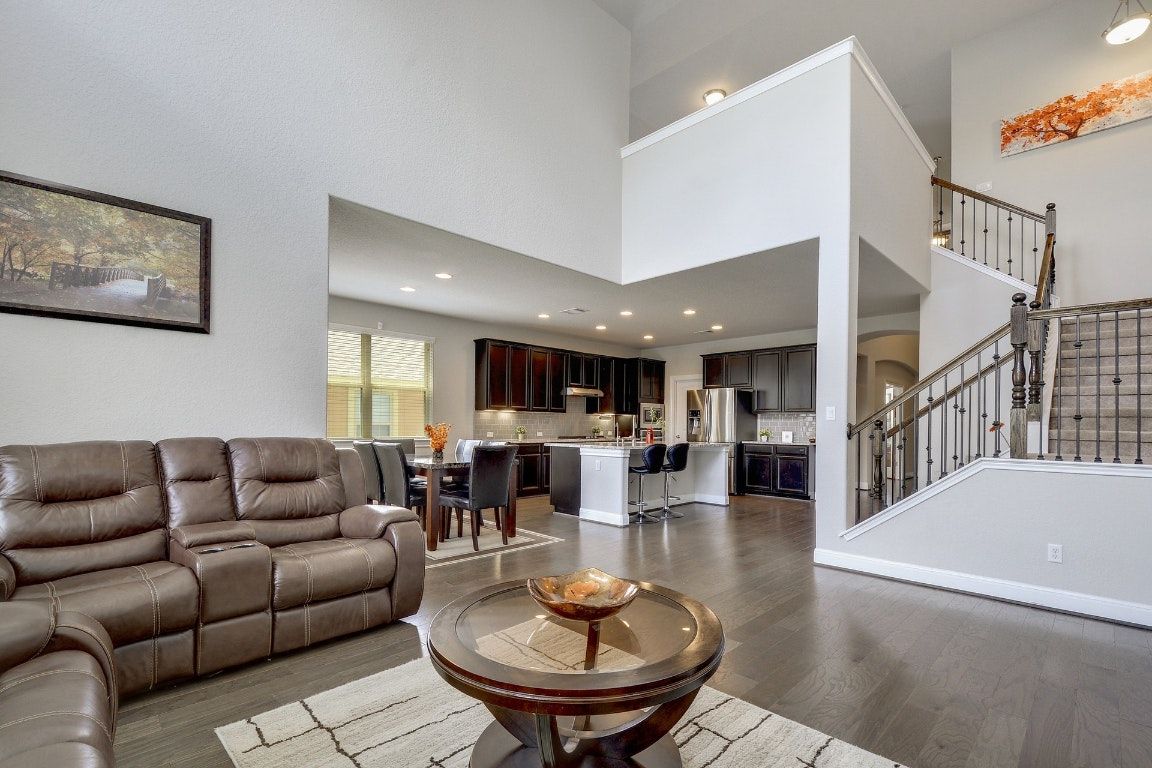 Dining room, Interior, Kitchen, Living room, Recessed Lighting, Stainless Steel Appliances, Wood Texture Flooring
