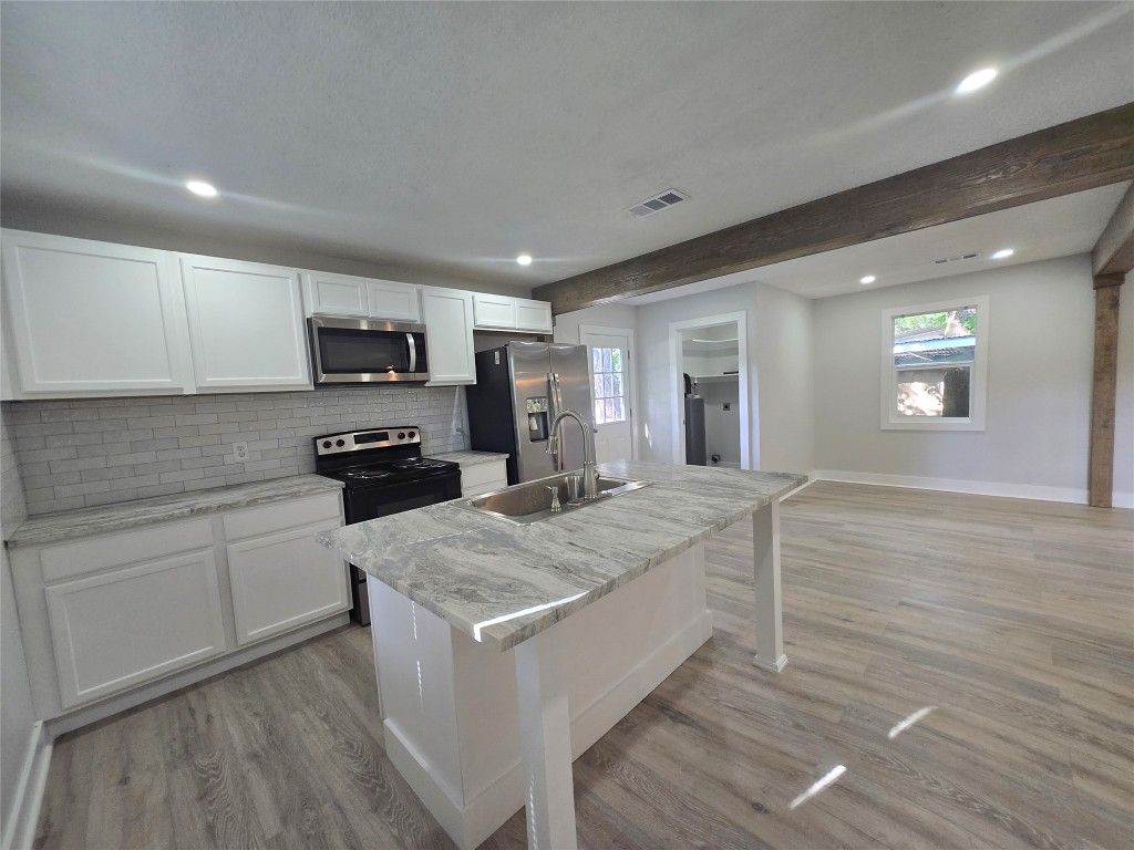 Interior, Kitchen, Recessed Lighting, Stainless Steel Appliances, Wood Texture Flooring