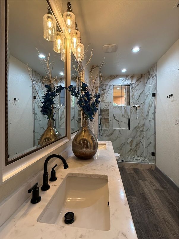Bathroom, Glass Shower, Interior, Marble Walls, Recessed Lighting, Wood Texture Flooring