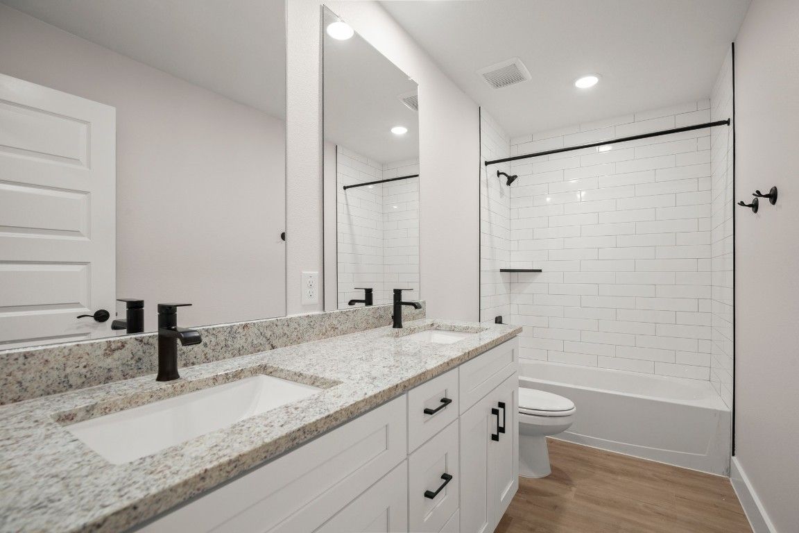 Bathroom, Dual Sink Vanities, Interior, Recessed Lighting, Wood Texture Flooring