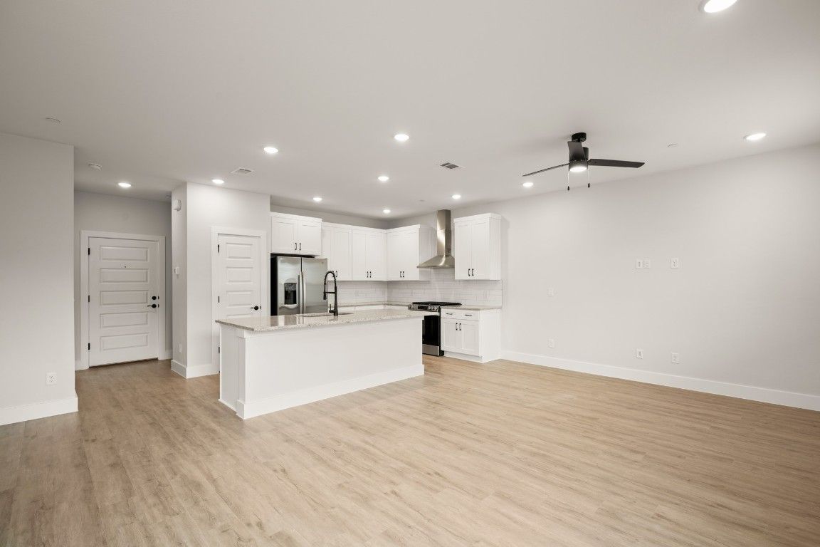 Interior, Kitchen, Recessed Lighting, Stainless Steel Appliances, Wood Texture Flooring