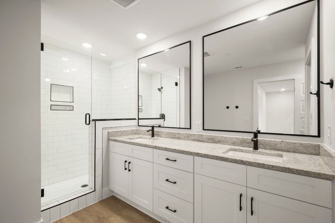Bathroom, Dual Sink Vanities, Interior, Recessed Lighting, Wood Texture Flooring