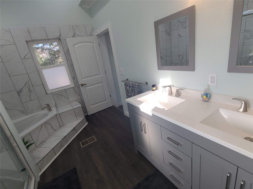 Bathroom, Dual Sink Vanities, Interior, Marble Walls, Wood Texture Flooring