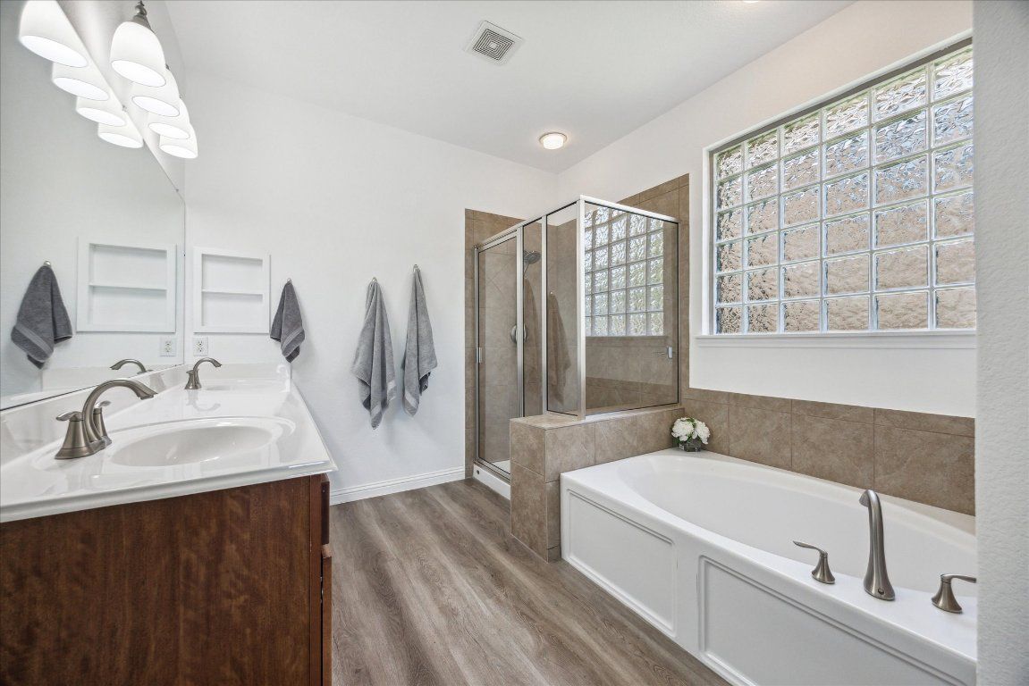 Bathroom, Dual Sink Vanities, Glass Shower, Interior, Wood Texture Flooring