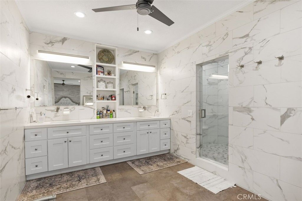 Bathroom, Dual Sink Vanities, Glass Shower, Interior, Marble Walls, Recessed Lighting