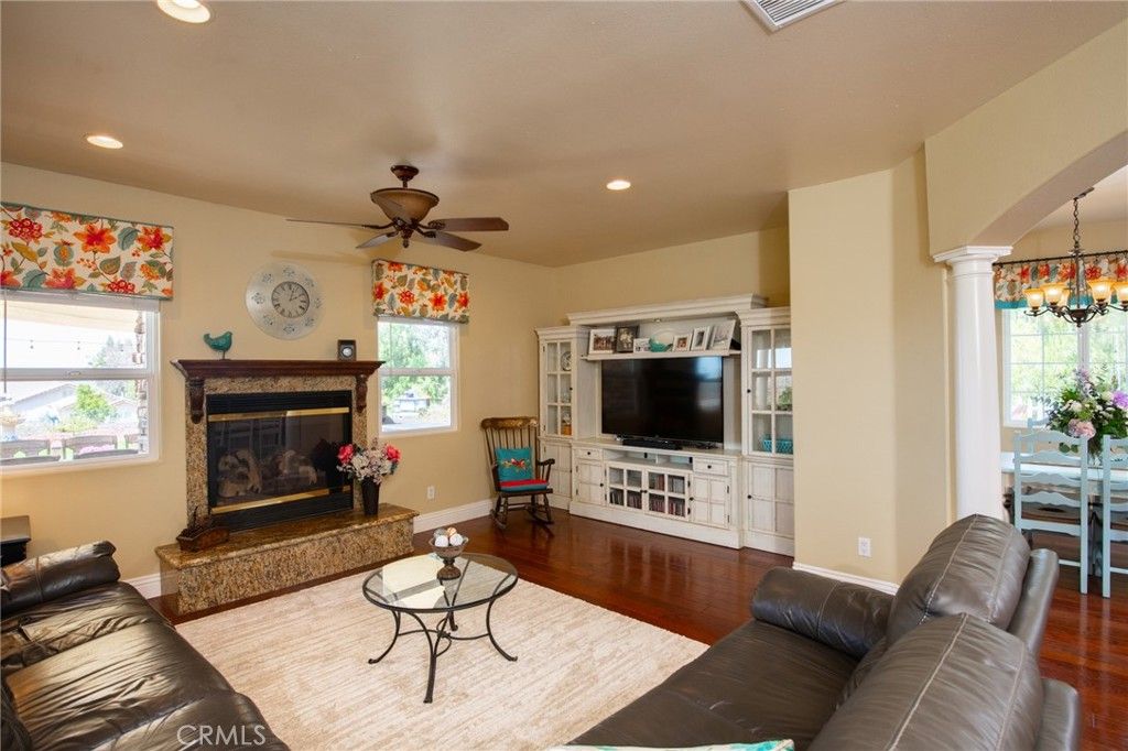 Dining room, Fireplace, Interior, Living room, Recessed Lighting, Wood Texture Flooring