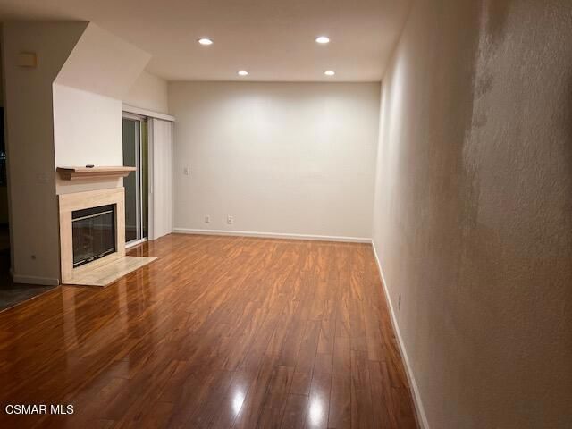 Empty room, Fireplace, Interior, Recessed Lighting, Wood Texture Flooring