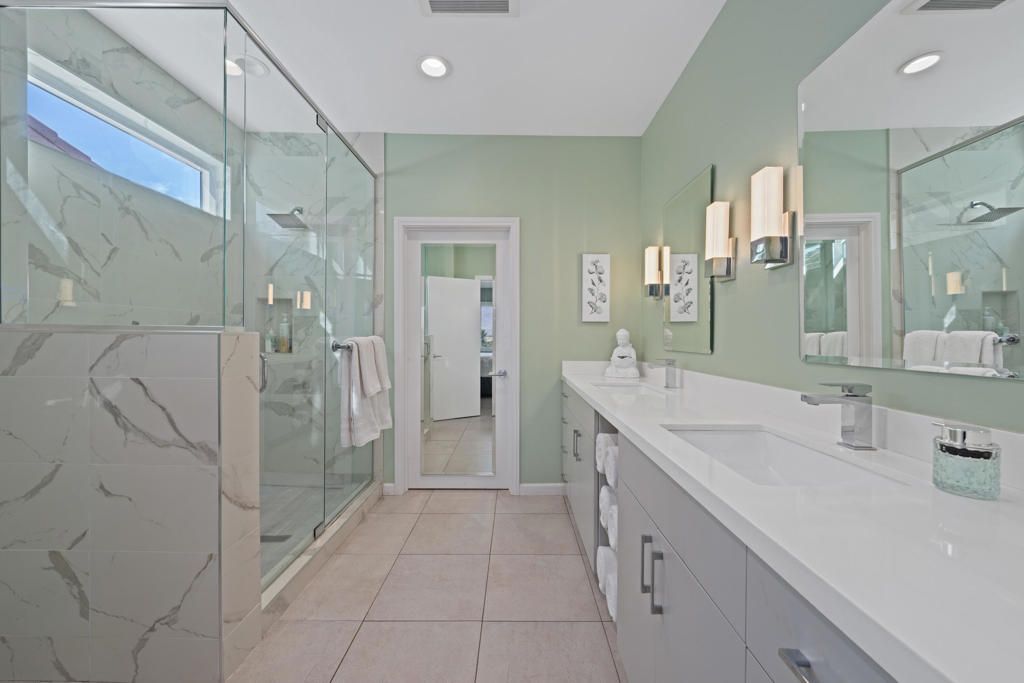 Bathroom, Dual Sink Vanities, Glass Shower, Interior, Marble Walls, Recessed Lighting