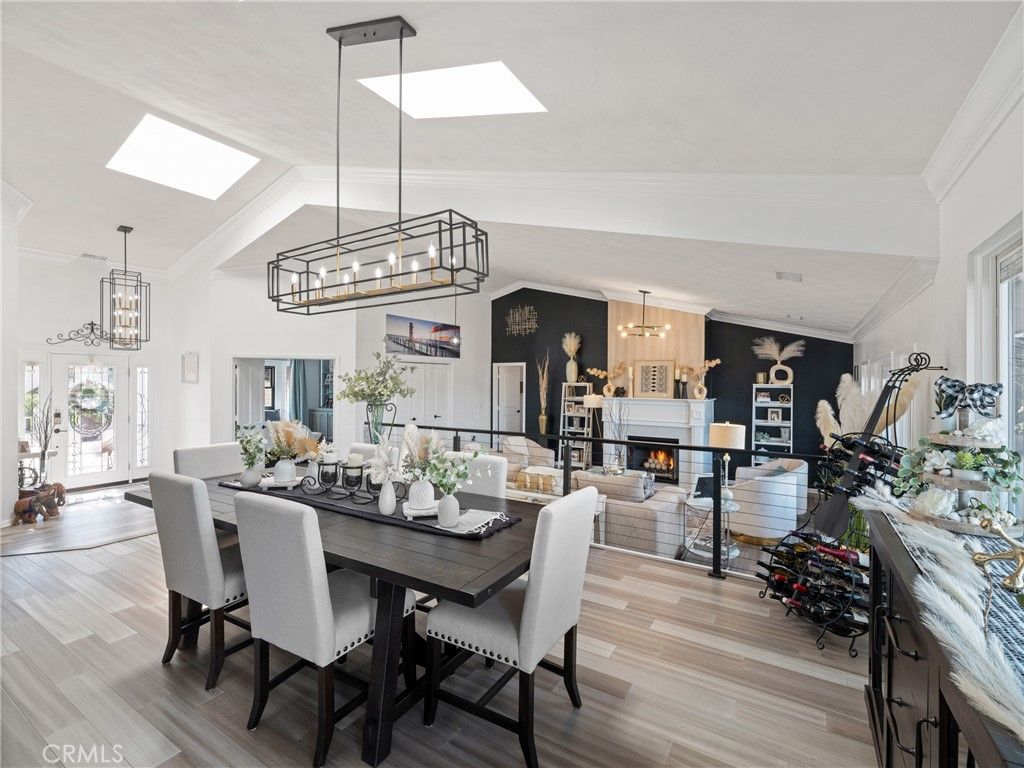Chandelier, Dining room, Fireplace, Interior, Living room, Pendant Lights, Wood Texture Flooring