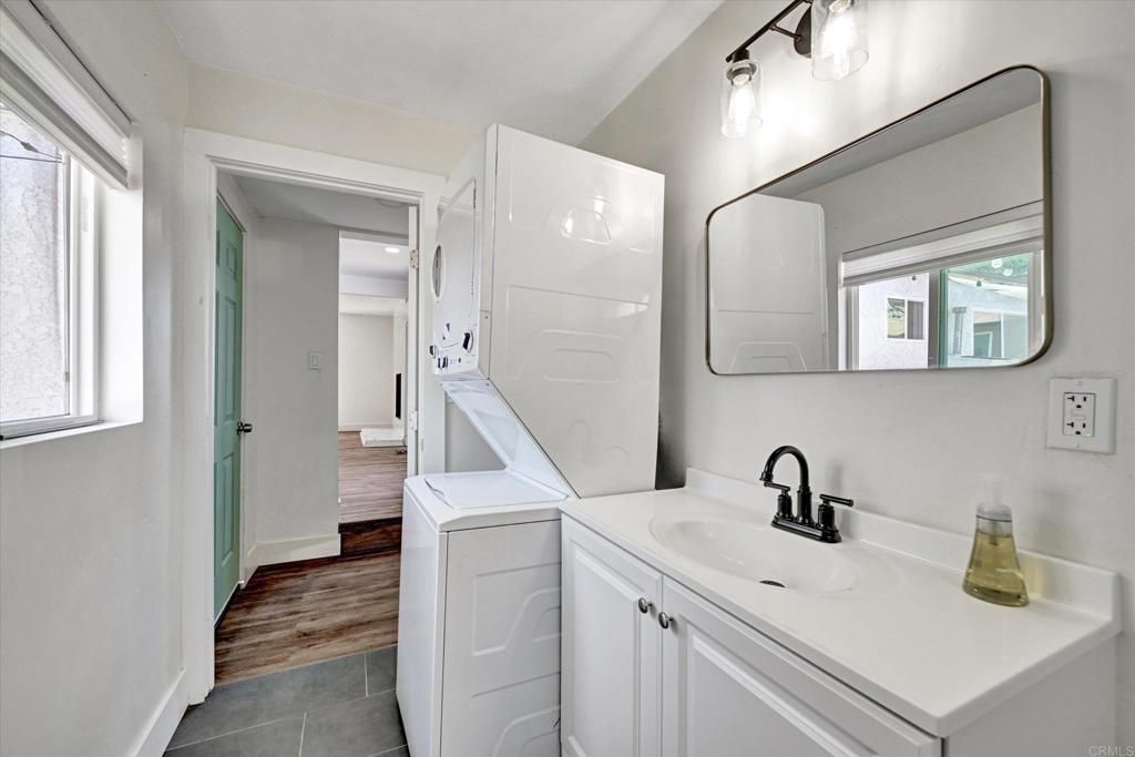 Bathroom, Dual Sink Vanities, Interior, Washer, Wood Texture Flooring