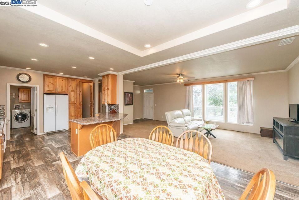 Dining room, Interior, Kitchen, Recessed Lighting, Washer, Wood Texture Flooring