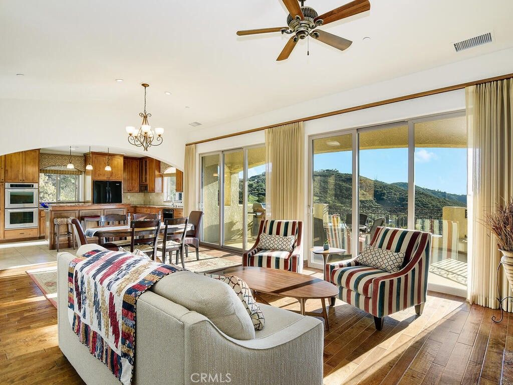 Chandelier, Dining room, Interior, Kitchen, Recessed Lighting, Stainless Steel Appliances, Wood Texture Flooring