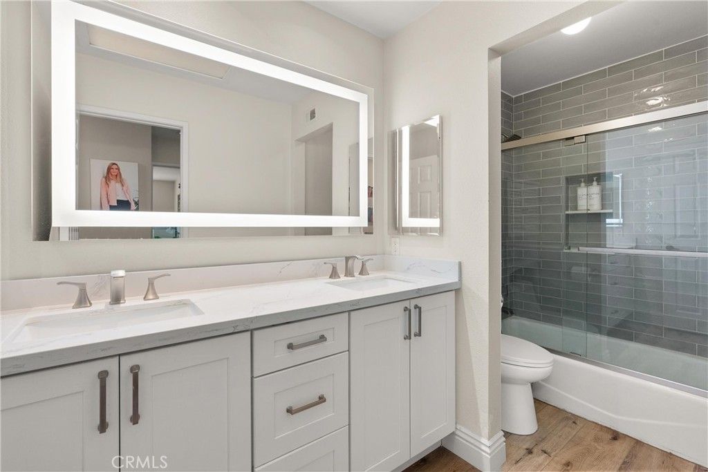 Bathroom, Dual Sink Vanities, Glass Shower, Interior, Wood Texture Flooring