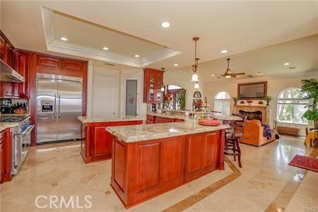 Fireplace, Interior, Kitchen, Living room, Pendant Lights, Recessed Lighting, Stainless Steel Appliances