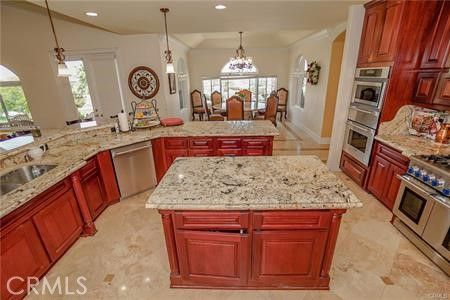 Chandelier, Dining room, Interior, Kitchen, Pendant Lights, Recessed Lighting, Stainless Steel Appliances