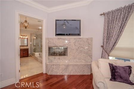 Bathroom, Chandelier, Fireplace, Interior, Wood Texture Flooring