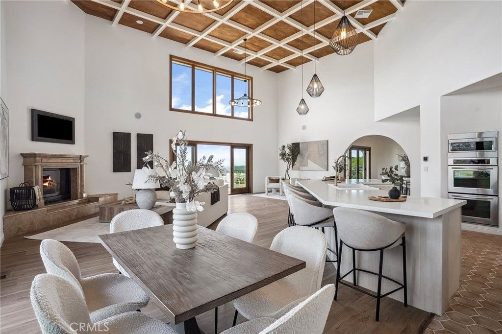 Dining room, Fireplace, Interior, Kitchen, Pendant Lights, Stainless Steel Appliances, Wooden Beams, Wood Texture Flooring
