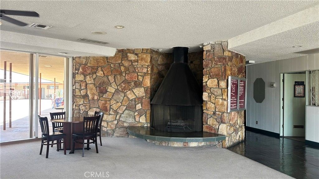 Dining room, Fireplace, Interior, Recessed Lighting, Stone Walls