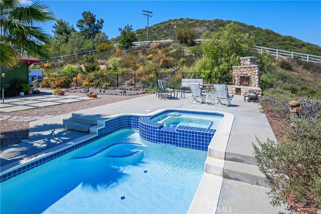 Exterior, Fireplace, Pool