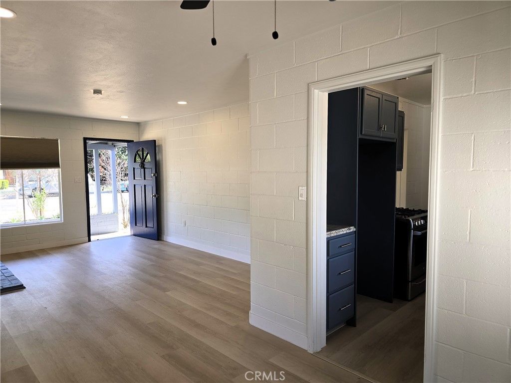 Empty room, Interior, Recessed Lighting, Stone Walls, Wood Texture Flooring