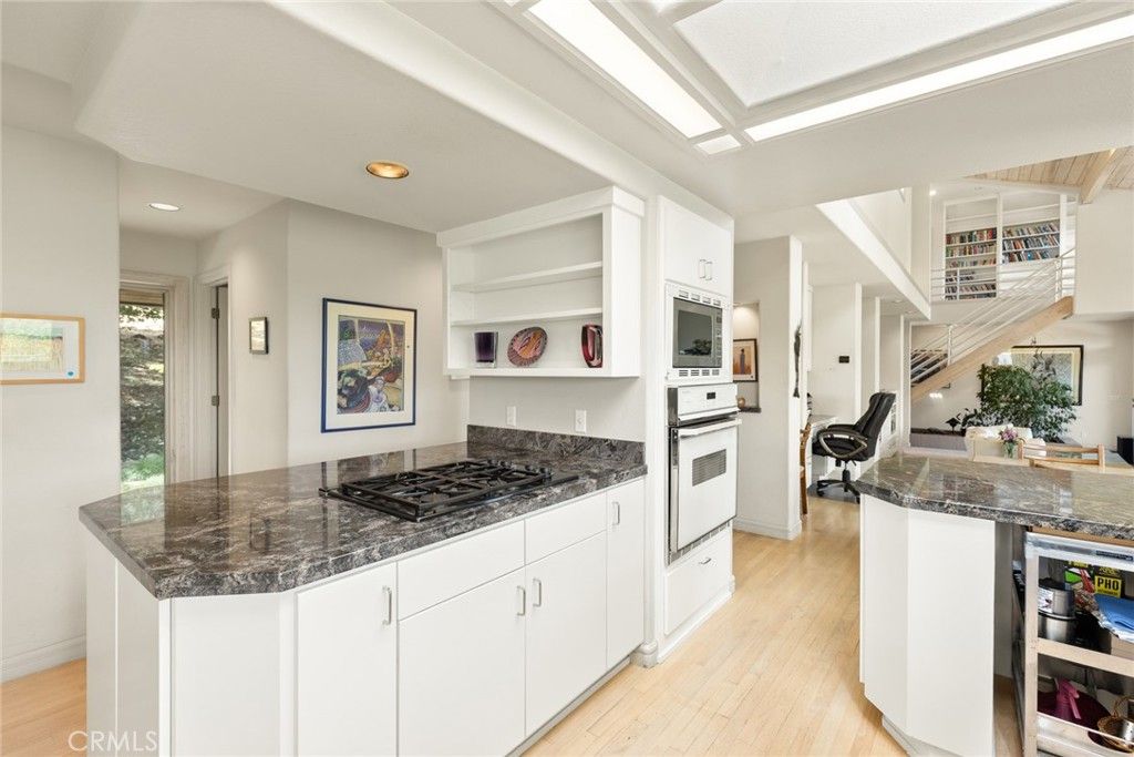 Fitness Equipment, Interior, Kitchen, Recessed Lighting, Stainless Steel Appliances, Wood Texture Flooring
