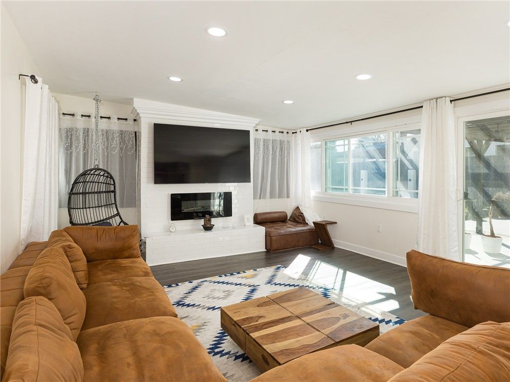Fireplace, Interior, Living room, Recessed Lighting, Wood Texture Flooring
