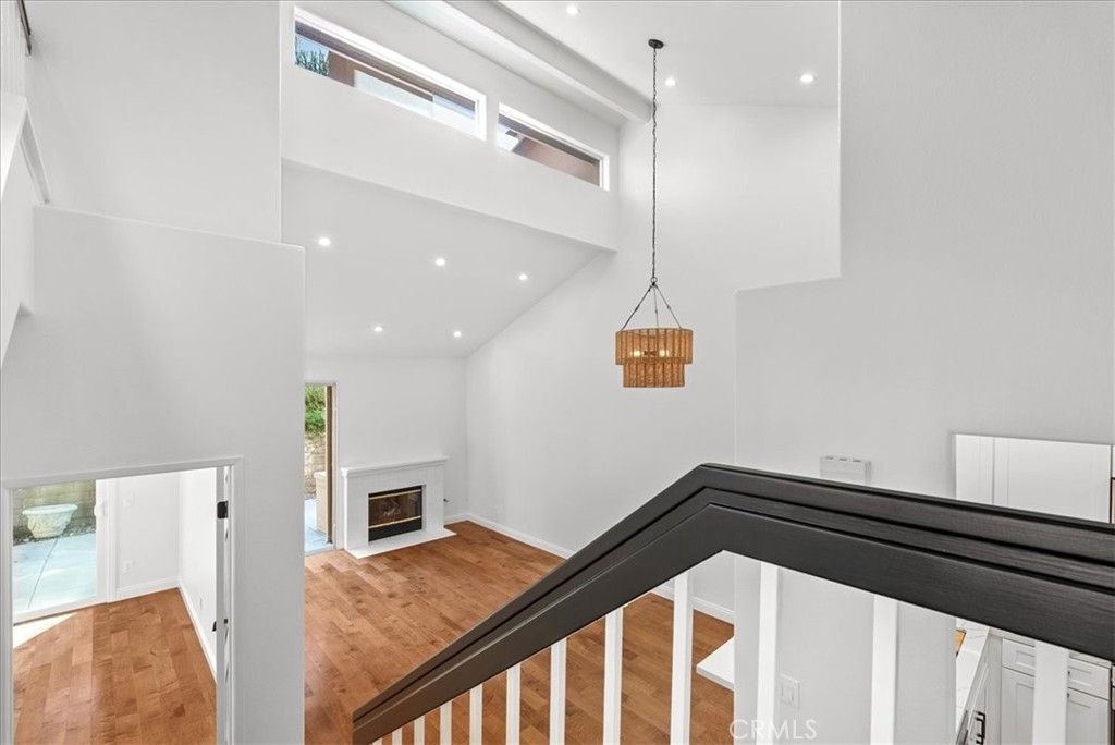 Fireplace, Interior, Pendant Lights, Recessed Lighting, Wood Texture Flooring