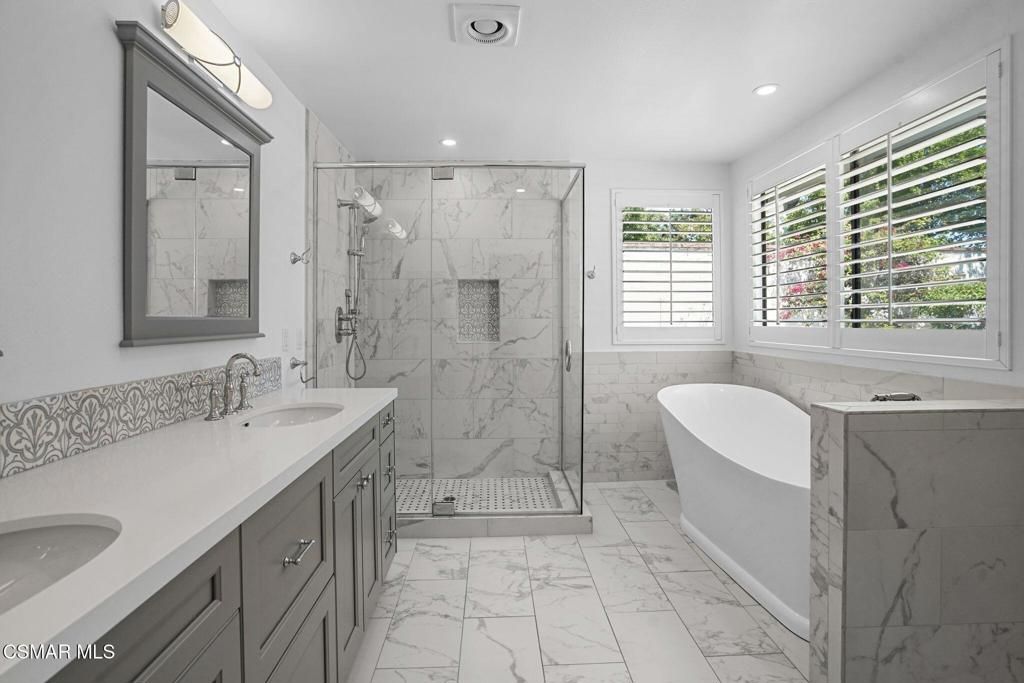 Bathroom, Dual Sink Vanities, Free Standing Baths, Glass Shower, Interior, Marble, Marble Walls, Recessed Lighting