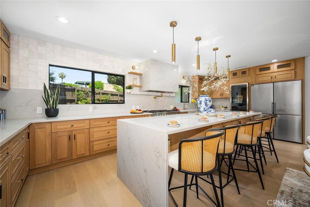 Interior, Kitchen, Marble Walls, Pendant Lights, Recessed Lighting, Stainless Steel Appliances, Wood Texture Flooring