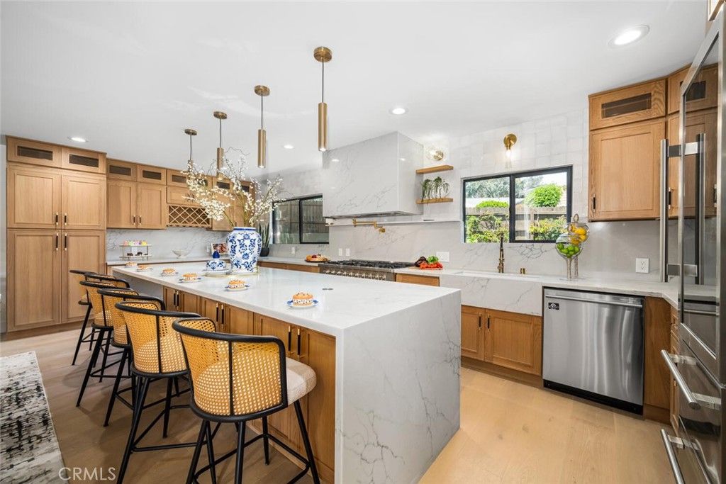 Interior, Kitchen, Marble Walls, Pendant Lights, Recessed Lighting, Stainless Steel Appliances, Wood Texture Flooring
