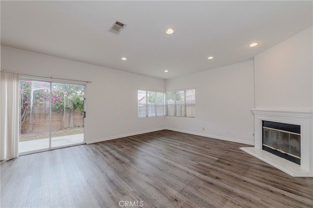 Empty room, Fireplace, Interior, Recessed Lighting, Wood Texture Flooring