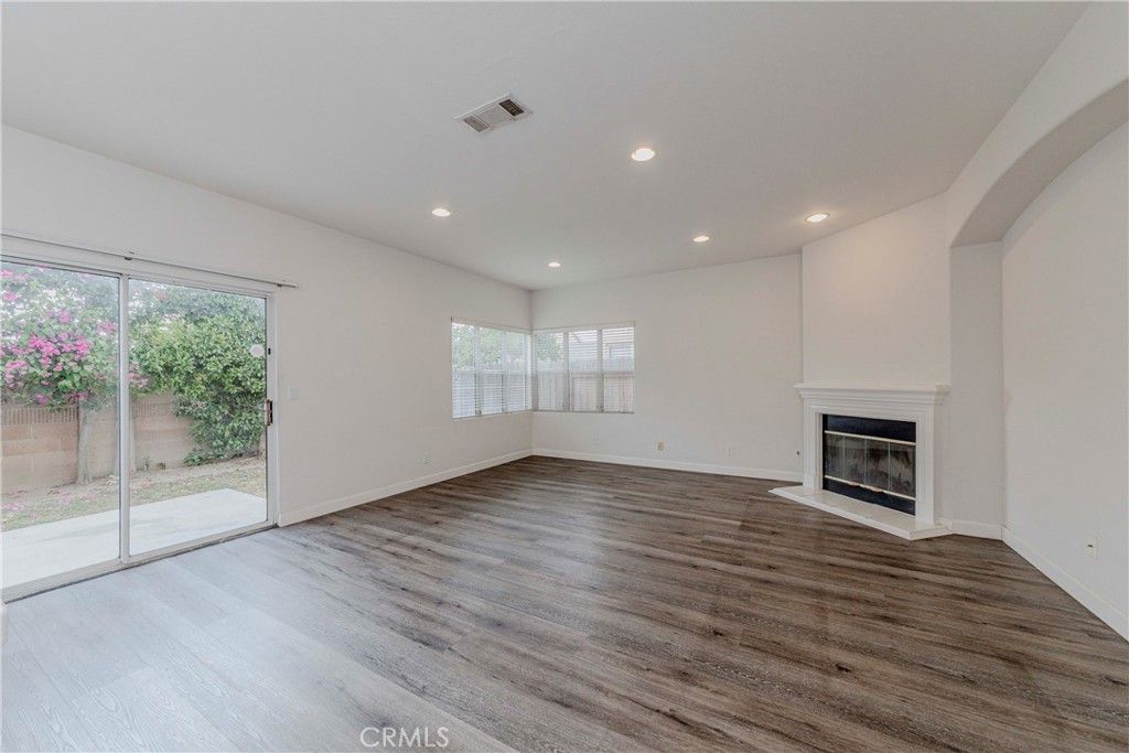 Empty room, Fireplace, Interior, Recessed Lighting, Wood Texture Flooring